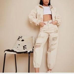 Ecru all over distressed baggy jogger jeans